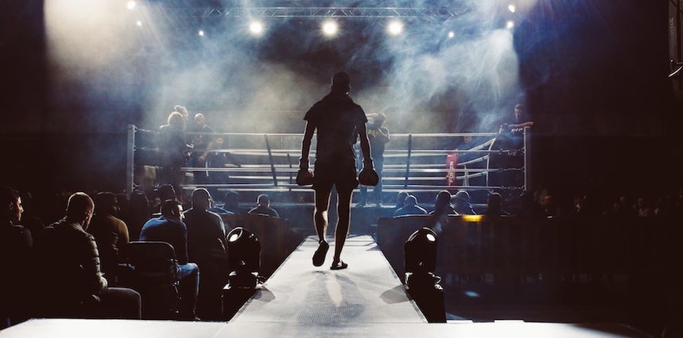 A fighter walking into the ring